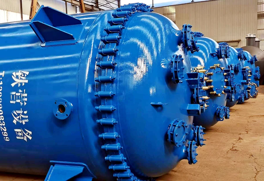 Blue industrial reaction vessels for synthesis and polymerization duties